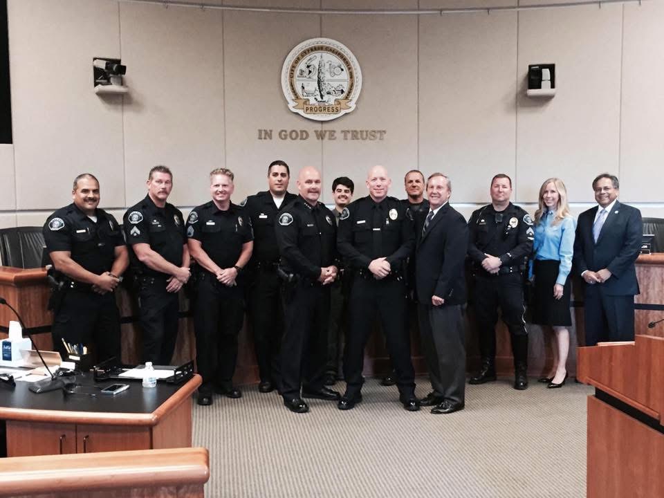 Paulo Morales with Cypress Police Department officers